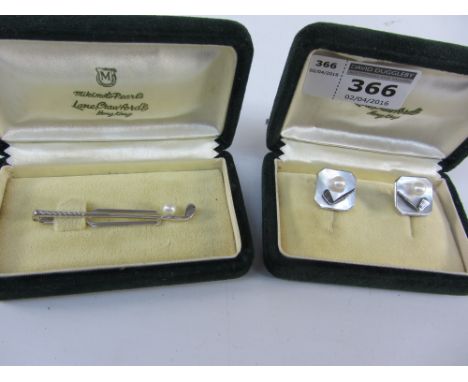 Mikimoto pearl golf club tie-pin stamped silver and a pair of similar cuff-links both boxed