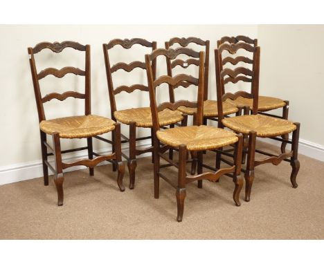 19th century French country oak ladder back chairs with rush seats, carved detail Condition Report Click here for further ima