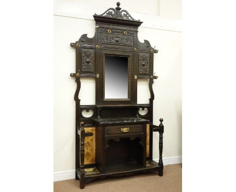 Late Victorian large oak hallstand, centre bevel edged mirror above marble top and single drawer, umbrella/stick stands with 