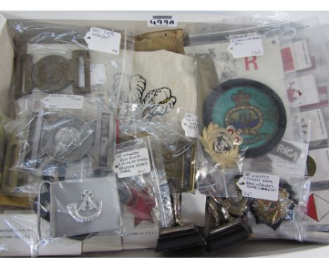 Early 20th century hand stitched regimental coats of arms, enamel recruiting sign, cigarette cards, assorted belt buckles and