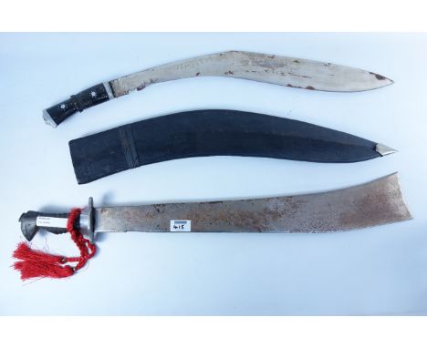 Indian Kukri short swords, 59cm blade in leather scabbard and another sword  Condition Report Click here for further images, 