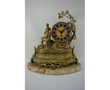 Brass figural mantel clock, girl with a deer, on marble plinth, W32cm, H31cm
CLOCKS & BAROMETERS - as we are not a retailer, 