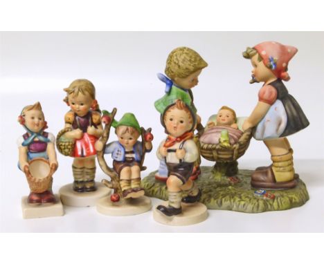 Hummel figure group and four figures Condition reports are not available for this sale.