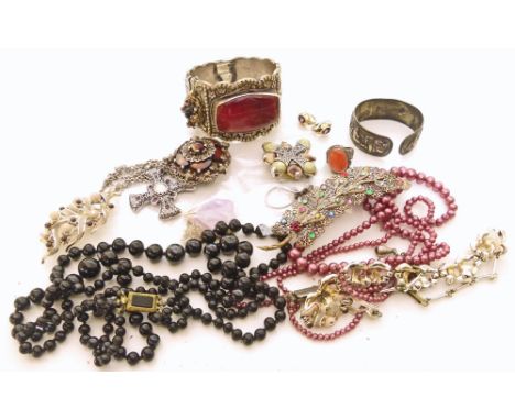 An assortment of costume jewellery including three Celtic style costume brooches by "Miracle", 3-row cultured pearl necklace,