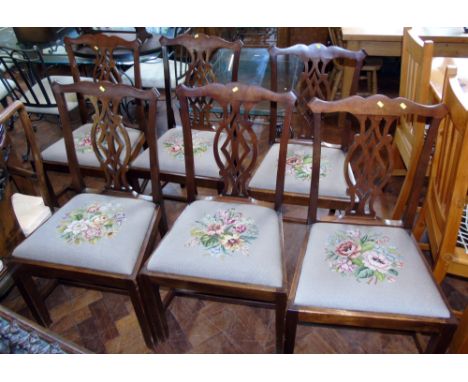 Six 19th century mahogany Chippendale style single chairs with tapestry seats. Condition reports are not available for this s