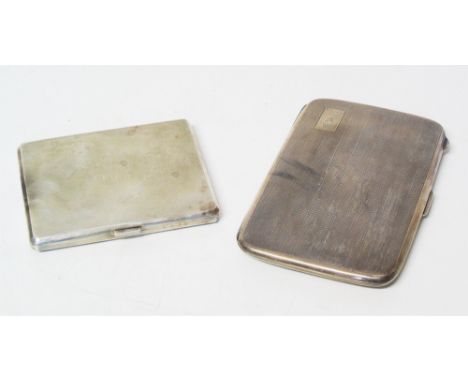 Two silver cigarette cases with engine turned decoration, gross weight approximately 319g Condition reports are not available