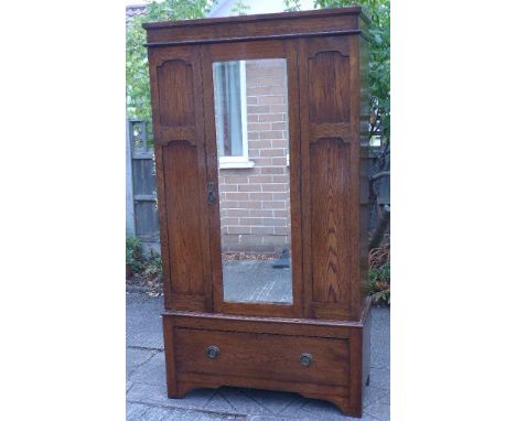 Early 20th century oak mirror-door wardrobe. Condition reports are not available for this sale.