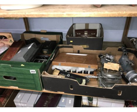 Shelf of scientific tools, gauges etc