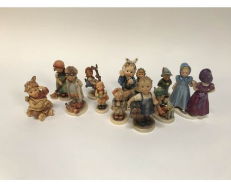 Twelve various Hummel figures
