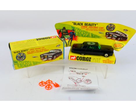 Corgi Toys - A boxed Corgi Toys #268 The Green Hornet 'Black Beauty'. The model in black with green interior with plastic fig