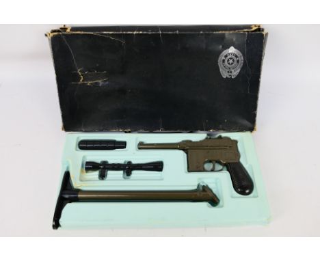 Lone Star - A boxed Lone Star 'LAPD' Mauser set. The vintage cap gun set contains Mauser, silencer, scope and stock. One of t