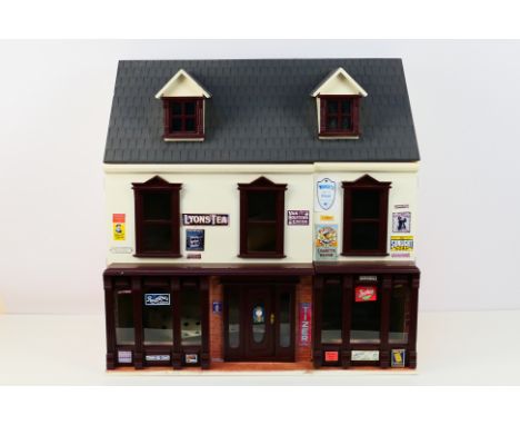 Unmarked Dolls House - A large two storey dolls house with opening roof section and two opening doors to the front. The house