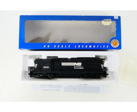 Bachmann - A boxed HO gauge GP50 Norfolk & Southern Diesel locomotive 6551. # 61241. The model is still taped into its packag