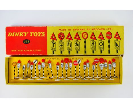 Dinky Toys - A boxed Dinky Toys #772 British Road Signs. The set contains 24 road signs which appear to range Good - Very Goo