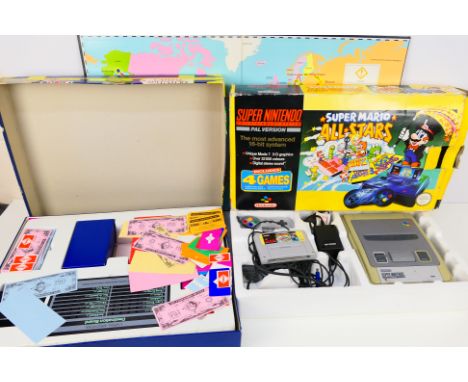 Nintendo - A boxed Super Nintendo system which comes with Super NES Control Dec; one controller cables and AC adapter plus ga