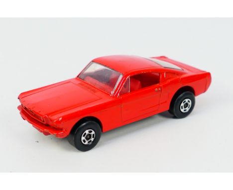 Matchbox - A rare Matchbox No.8 Mustang in red livery with red interior and wide wheels.  The item appears overall in very go