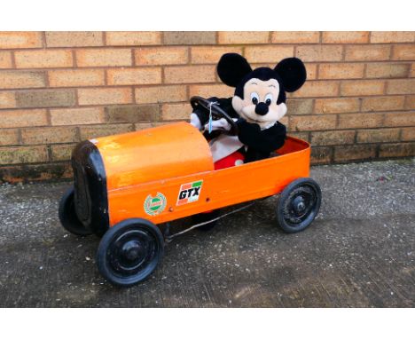 Tri-ang - A vintage Tri-ang Pedal Car with large Mickey Mouse soft toy. Pedal car shows signs of play, age and repaint appear