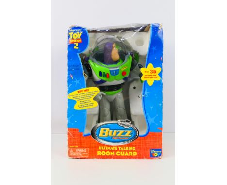 Thinkway Toys - A boxed Thinkway Toys #62978  Toy Story 2 Buzz LIghtyear Ultimate Talking Room Guard. The toy would benefit f