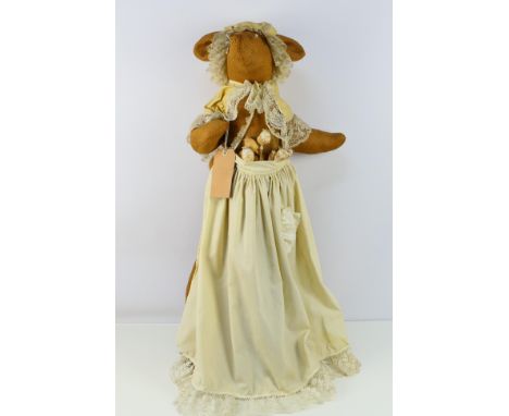 A large hessian made mouse. The Vendors states that the mouse was a display piece from a tailors shop and measures approximat