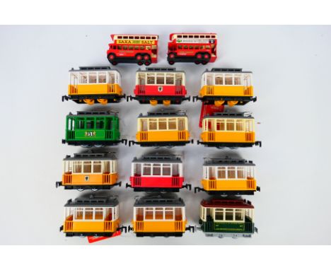 Lehmann - A collection 12 unboxed plastic Lehmann #970 Gnomy predominately friction powered Trolley Cars. Most exhibit signs 