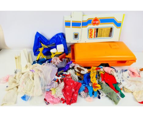 Pedigree - Sindy - A collection of vintage Sindy items including Caravan, Scooter and a quantity of clothing, only a couple o