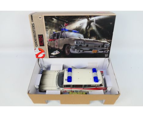 Hasbro - A boxed 1:18 scale plastic Hasbro 'Ghostbusters' Ecto-1 Plasma Series. The model appears to be in Mint condition and