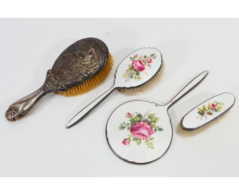 A group of dressing table items to include an Art Nouveau silver mounted brush, Birmingham assay 1903, sponsors mark for Thom