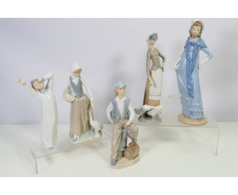 A collection of Lladro and Nao figures, largest approximately 31 cm (h). [W]NOTE: IN HOUSE SHIPPING IS NOT AVAILABLE FOR THIS