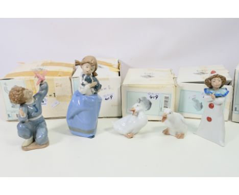 Nao by Lladro - five figurines comprising model numbers 01030 approx 15 cm, 00369 approx 8 cm, 00370 approx 8 cm, 01029 appro