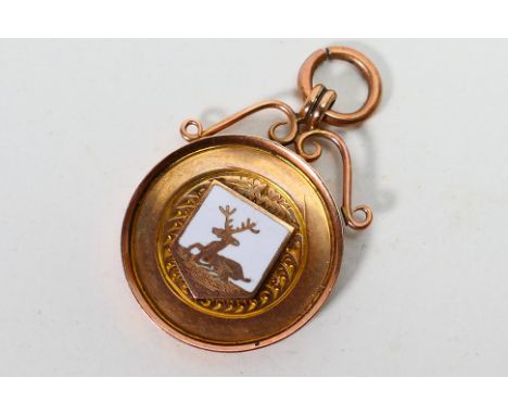 A 9ct rose gold and enamel medal, engraved N & D S S L Champions 1913-1914, approximately 4.2 grams. [W]