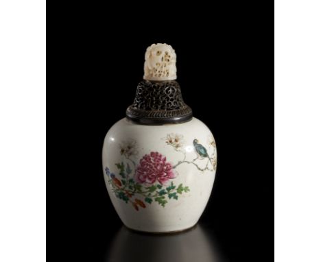 A fine ovoid jar decorated in the famille rose palette, with zitan pierced conver and important carved white jade finialChina