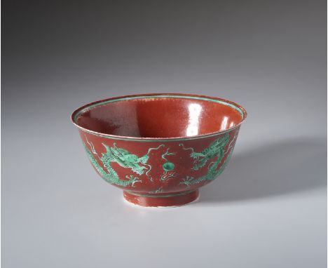 A fine and large Kangxi mark iron oxid ground with green dragons porcelain bowlChina, Qing, 19th century Cm 18,50 x 9,00