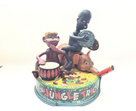 A Jungle Trio Linemar Japan Battery Operated vintage Tin Plate toy (Seen working).