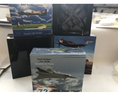 A collection of 5 diecast model aircraft all boxed.