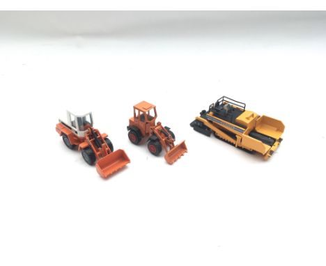 Collection of model vehicles. Boxed.Demagogue Road Finisher.Atlas AR41ASchaeff Wheel loader SKL