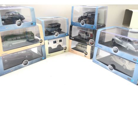 A Box Containing a collection of Oxford model Vehicles including a Fire Engine. A black sunbeam. A Austin Princess.etc.