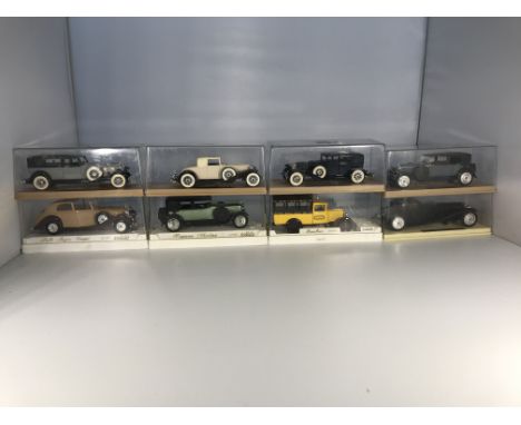 Eight Solido models cars in cases. Two Cord L29s, two Duesenberg Js (one in a box stating "Bugatti Atalante"), a convertible 