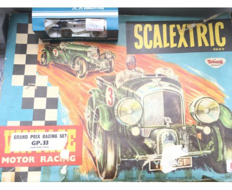 A Vintage Scalextric Grand Prix Racing Set #GP.33 (temporary Pack) and a boxed Shadow car # C.012.