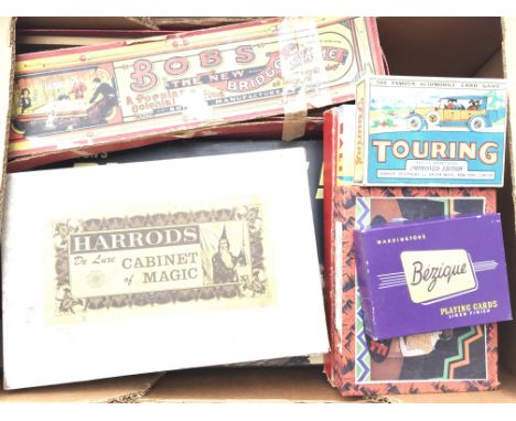 A box containing a collection of Vintage games.