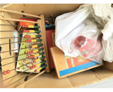 A Box Containing a collection of Toys and Games including a Jr Carpenters tool set. Building Bricks. Etc.