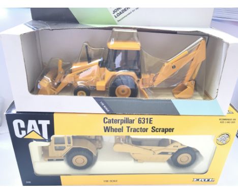 2 X Ertl Die Casts including a Caterpillar 631e Wheel TractorScraper and a John Deere Loader/Backhoe. Both boxed 1/50 Scale.