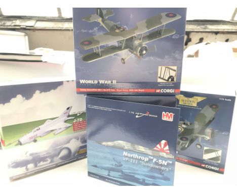 A collection of 4 model Aircraft including Corgi and Hobbymaster all boxed