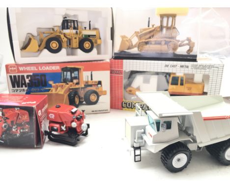 Various Boxed Vehicles including a Faun k 100. A Wheel Loader etc.