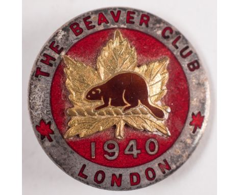 A WWII Canadian Soldier's Beaver Club badge by J R Gaunt, London:, red enamel with gilt maple leaf dated 1940, stamped to bac