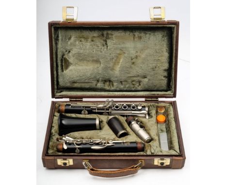 A  'Regent' clarinet by Bosey &amp; Hawkes, London No 458720 in a Buffet case:. 