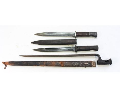 Two WWII period German K98 pattern bayonets:, one with steel scabbard, also a socket bayonet and a black leather scabbard wit