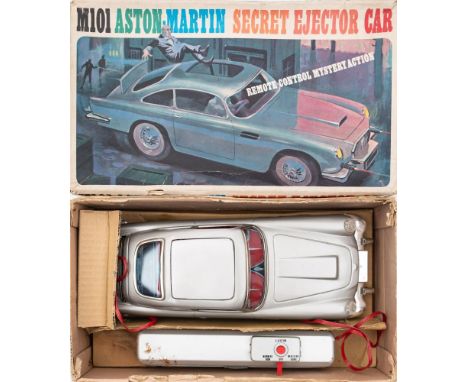 Durham Industries (USA) M101 Aston-Martin Secret Ejector Car:, based on the James Bond Aston Martin DB5, silver with lithogra