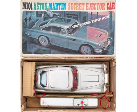 Durham Industries (USA) M101 Aston-Martin Secret Ejector Car:, based on the James Bond Aston Martin DB5, silver with lithogra