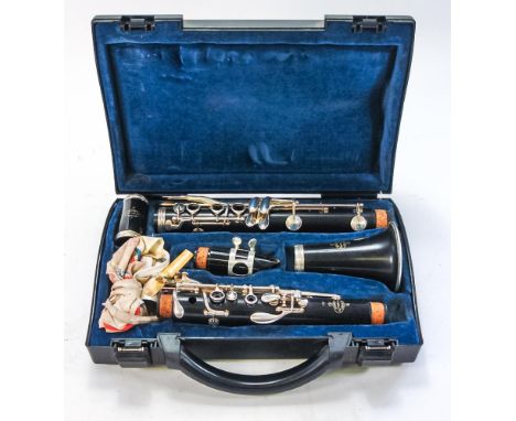 A Buffet-Crampon &amp; Son Ebony 'E11' Clarinet in fitted case:. 