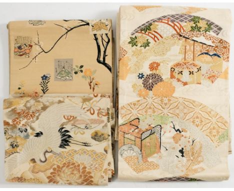 Three Japanese silk Obi (kimono sash):, one with cranes among peonies, another with  panels of figures in a tree , the third 